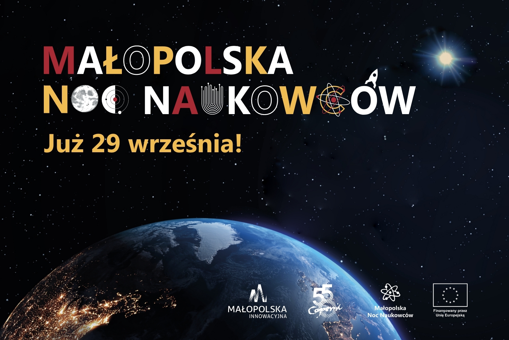 Baner z kolorowym napisem &quot;Małopolska Noc Naukowców już 29 września&quot; oraz widokiem kuli ziemskiej na czarnym tle